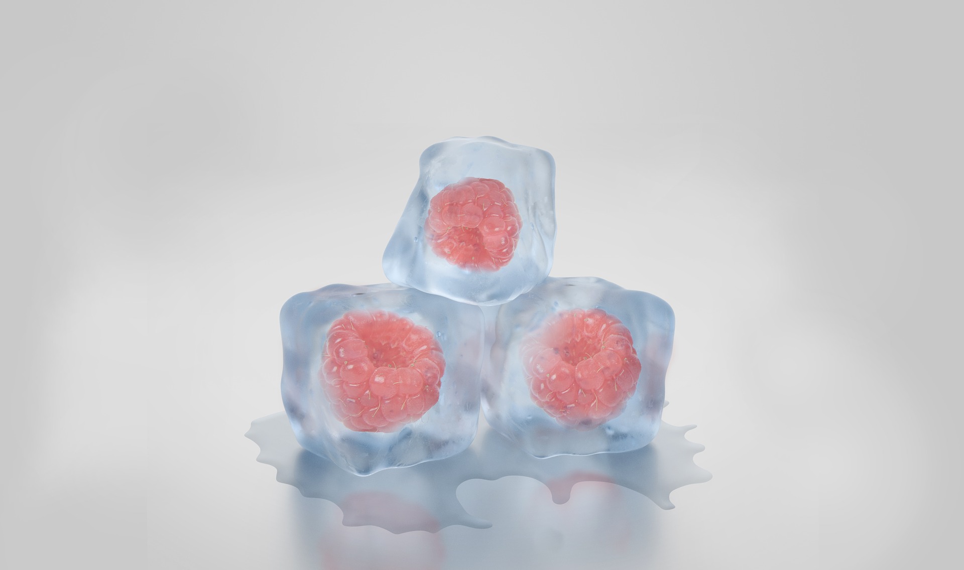 unique baby shower games. an image of raspberries frozen inside of ice cubes to symbolize the unique baby shower game called my water broke.
